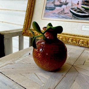 Ceramic vase with plant